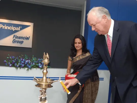 Barry Griswell at a lamp lighting ceremony